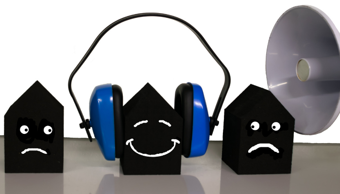 Graphic of toy houses wearing ear defenders