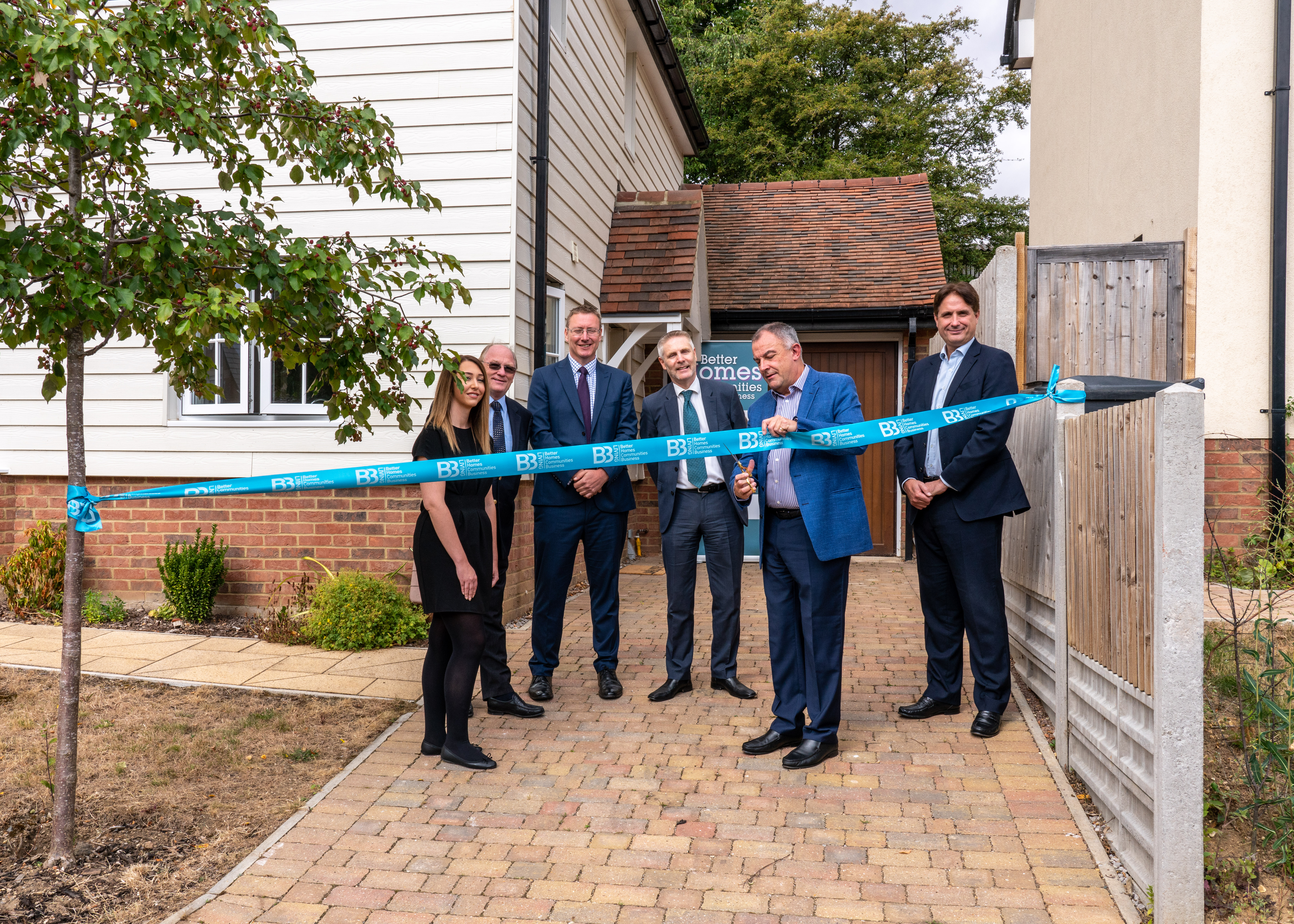 Photo of stakeholders opening new homes in Braughing