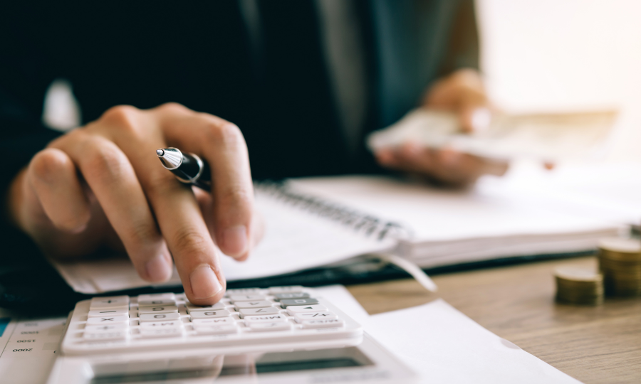image of person using calculator